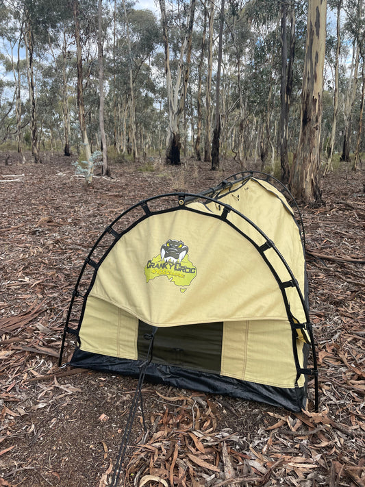 Dome Deluxe Single Swag set up long ways in bush land