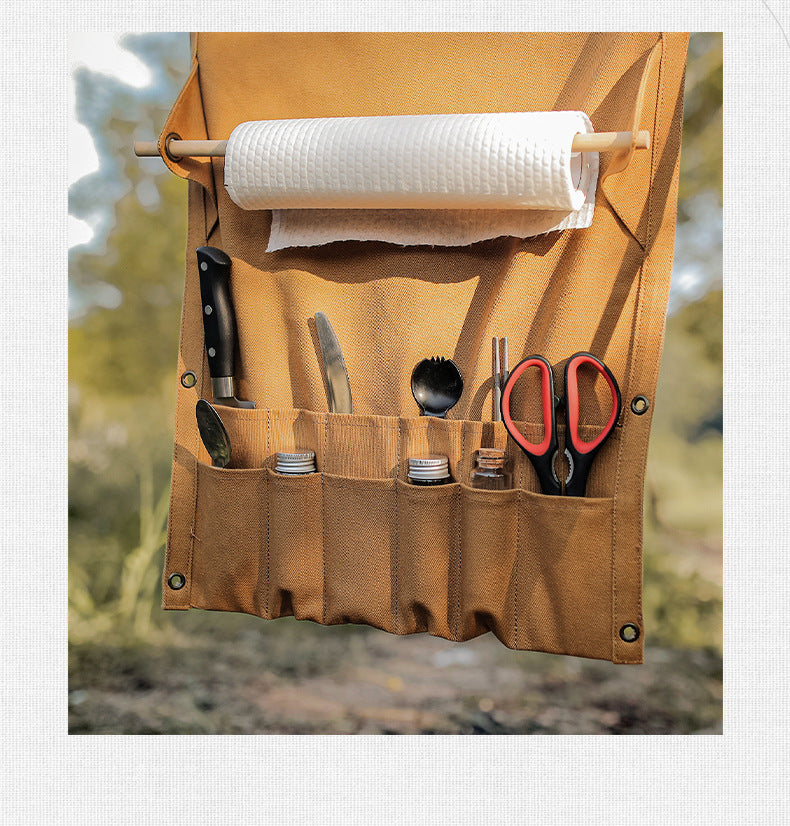 Image of Outdoor Kitchen Buddy being used to store paper towel and cooking utensils.