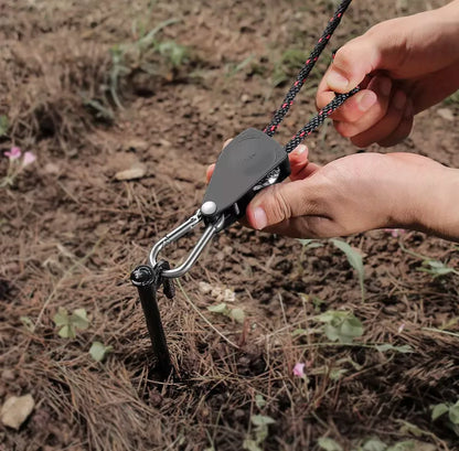 Person easily tensioning Tent Rope Pulley.