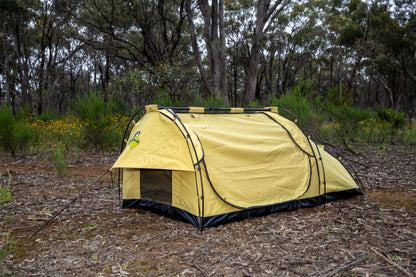 Dundee king single swag in a camping scene in Aussie bushland