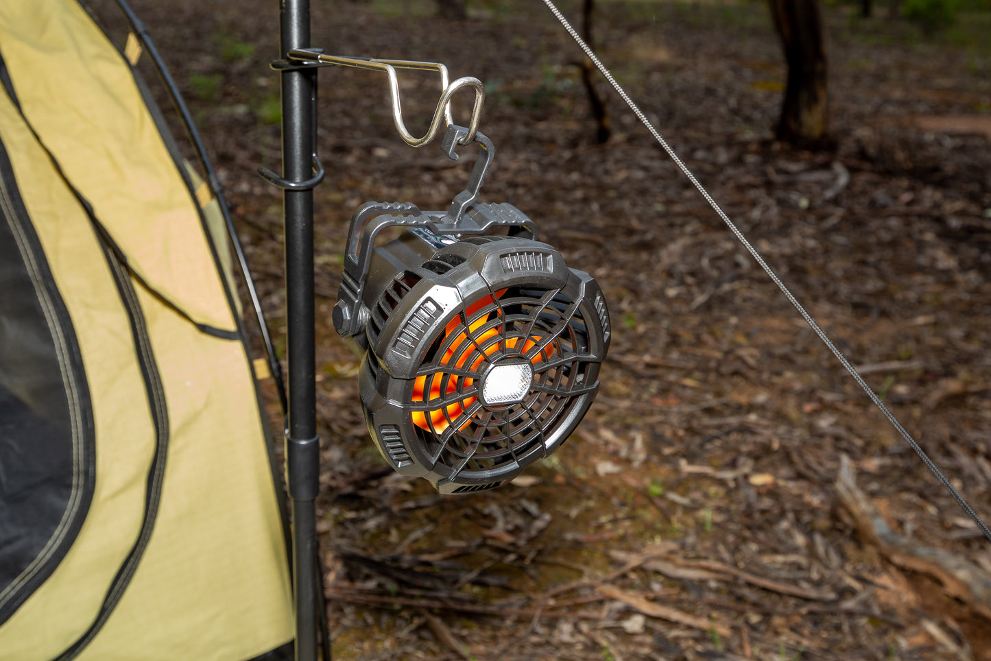 3 in 1 Rechargeable Fan, Light & Phone Charger hanging by built in hook from swag awning pole