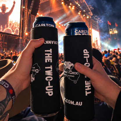 Two people cheersing with their two can, can coolers in the crowd of a concert 