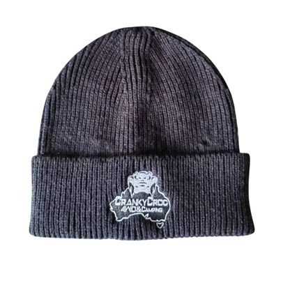 Thin black beanie with a white logo on a white background